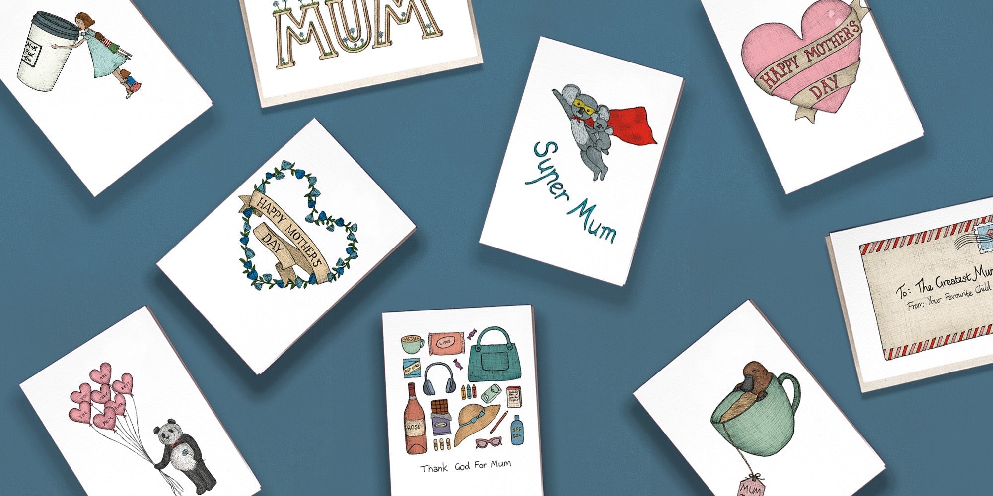 Hand illustrated Mother's Day cards againt a blue backdrop
