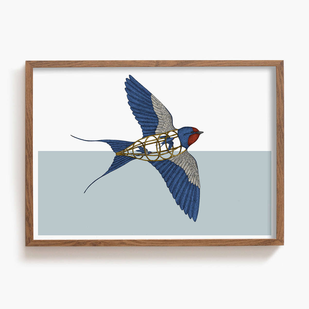 Framed artwork of a swallow with a cage inside on a light blue background