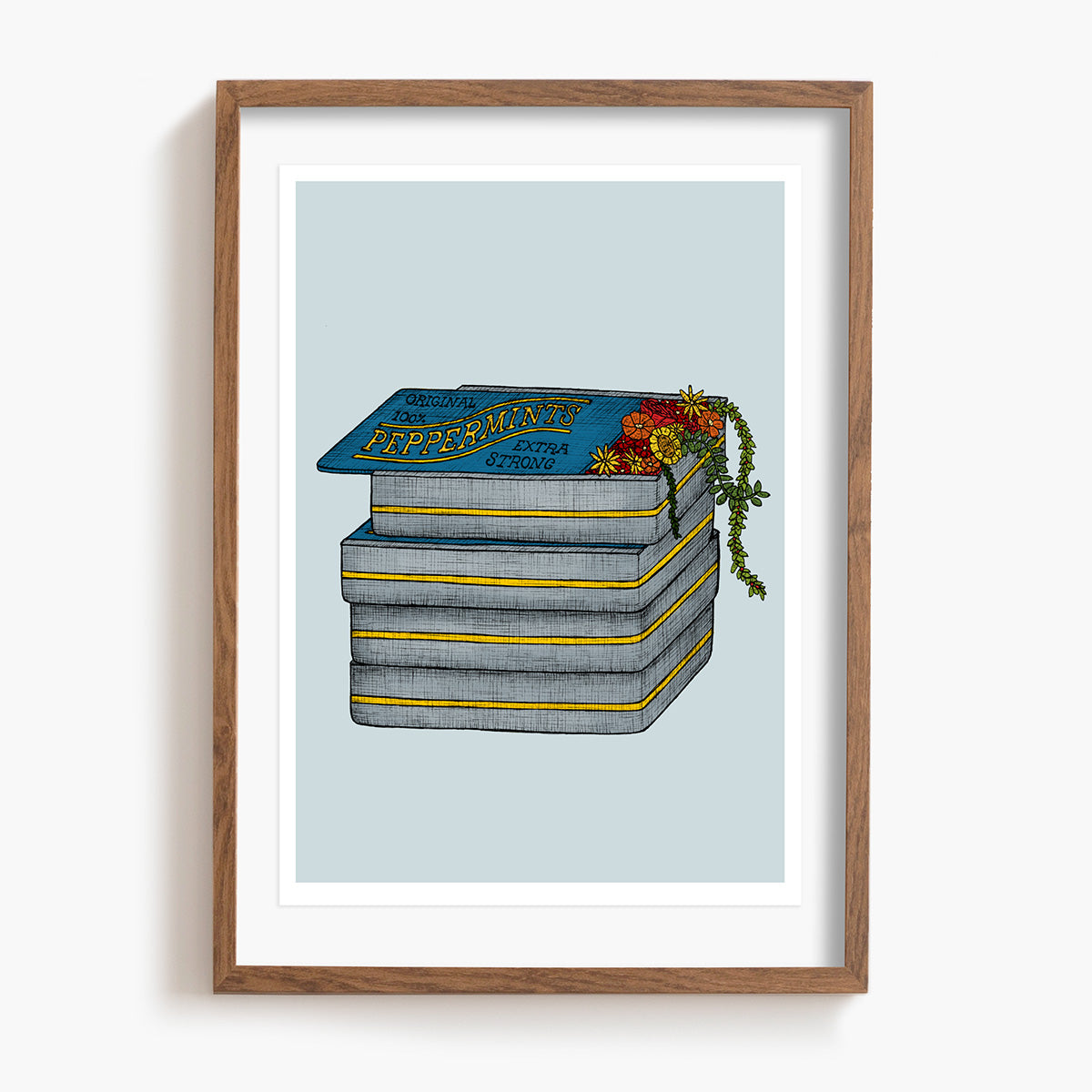 Framed artwork of a stack of peppermint tines with decorative flowers on a light blue background