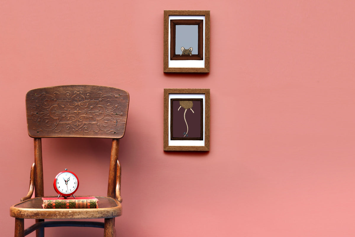 Marlon the mouse artwork framed on a pink wall