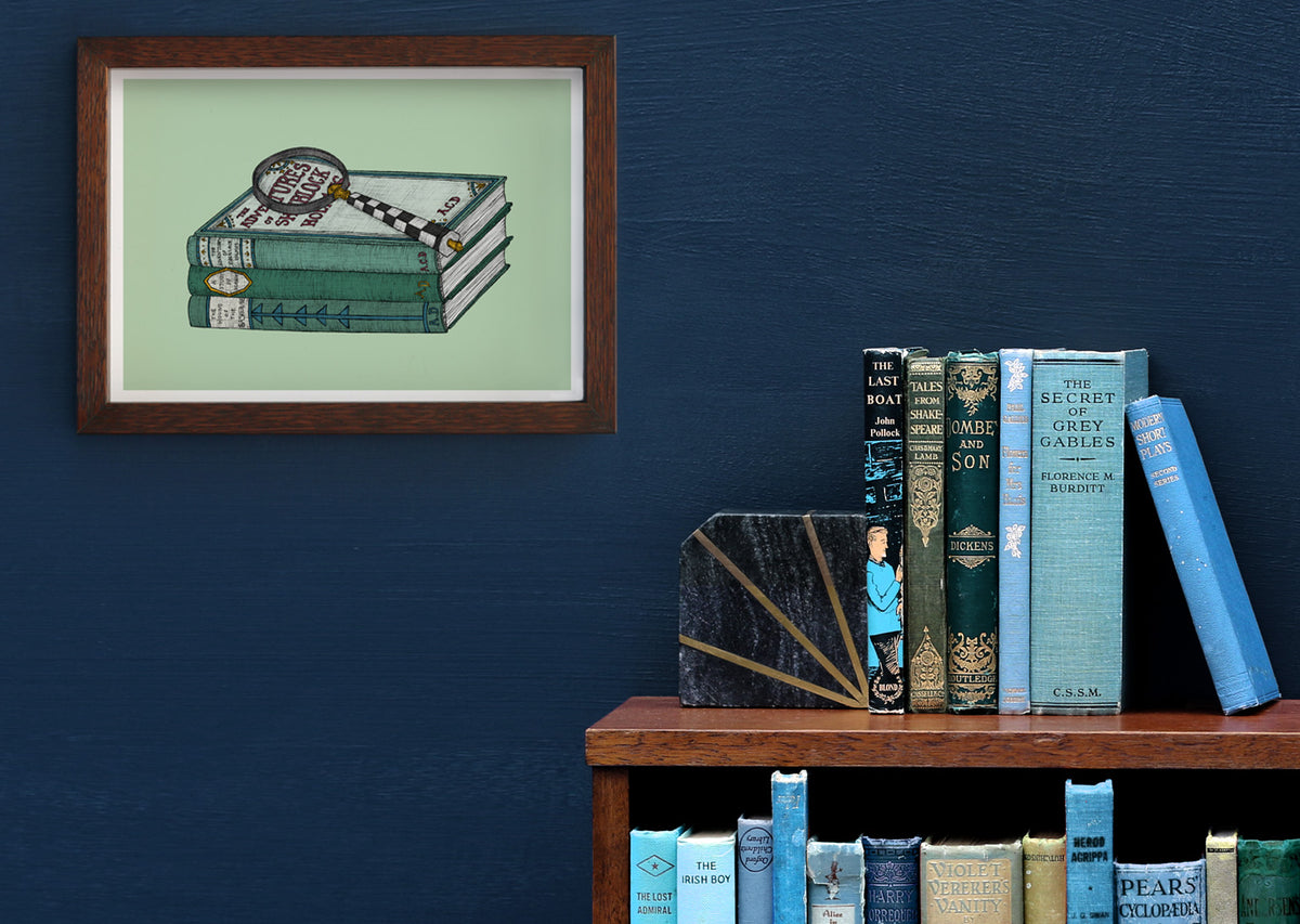 Sherlock Holmes art print framed on a blue wall