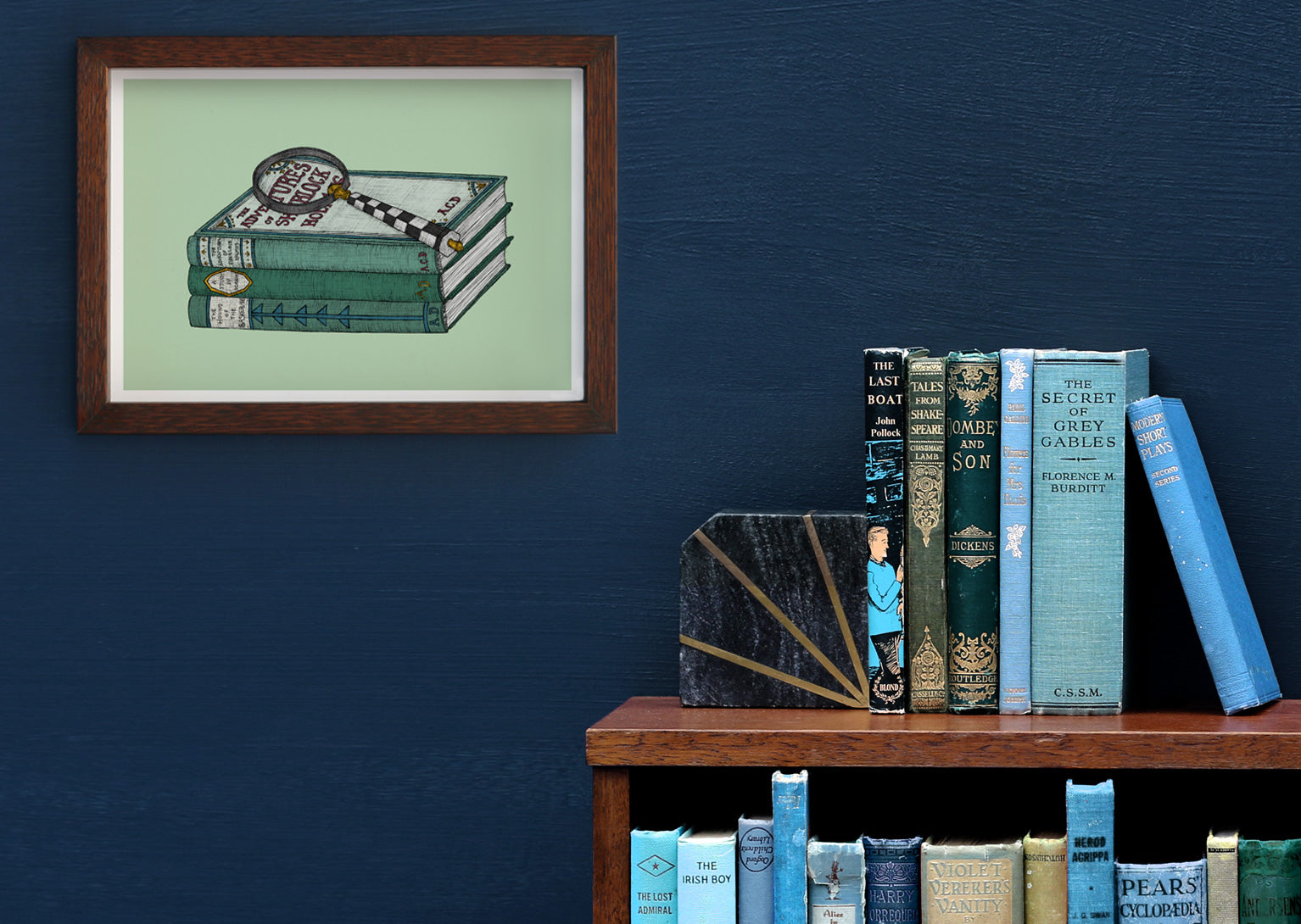 Sherlock Holmes art print framed on a blue wall