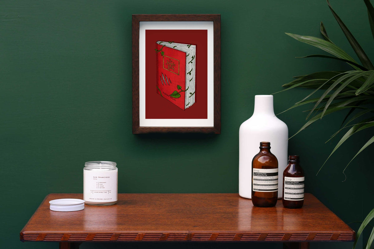 The Jungle Book art print framed on a green wall