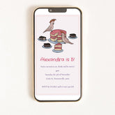 Phone displaying a birthday invitation with cake and cockatoo illustrations on a white background