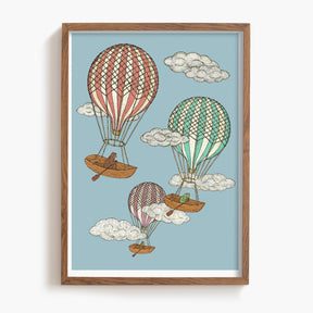 Framed artwork of hot air balloons and boats on a blue background