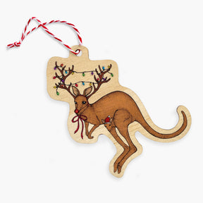 Wooden ornament shaped like a kangaroo with reindeer antlers and lights, on a white background.