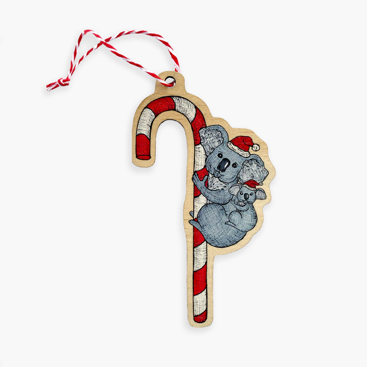 Decorative candy cane ornament with koala design on a white background