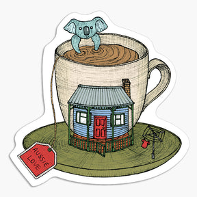 Magnet with an illustration of a cup of tea with a house and koala on a white background