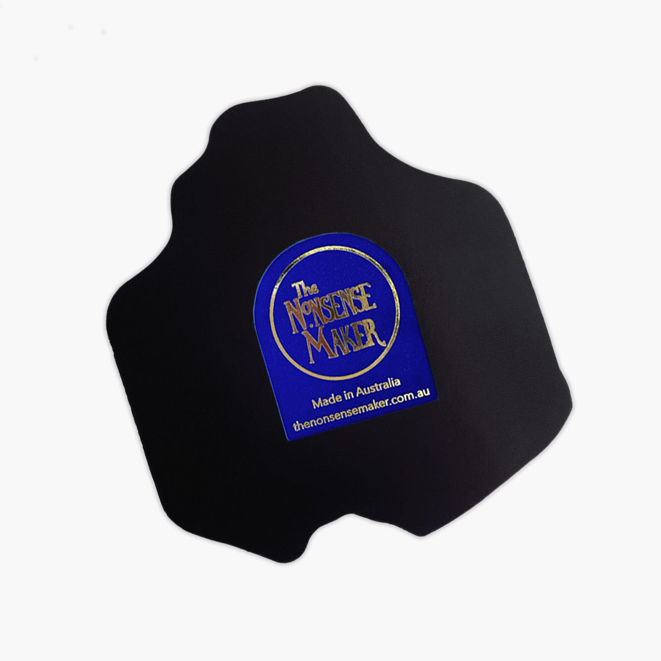 Back of a magnet with a blue label featuring 'The Nonsense Maker' on a white background