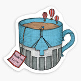 Magnet with an illustration of a teacup with hot air balloons and a Canberra Cuppa tag.