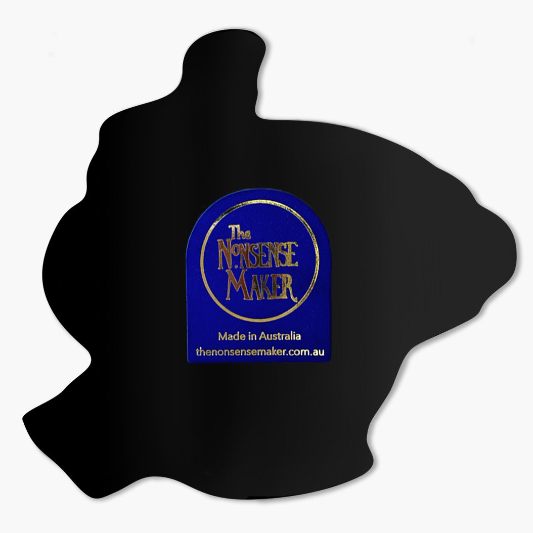 Back of a magnet with a branded The Nonsense Maker sticker