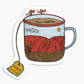 Magnet with an illustration of a teacup. On the teacup is Uluru and kangaroos.
