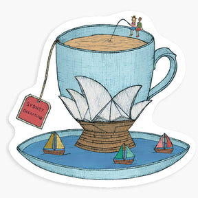 Magnet with an illustration of a tea cup with the Sydney Opera House inside, on a white background.