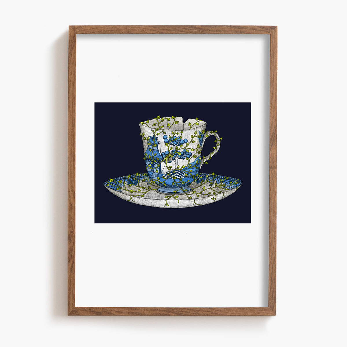 Framed artwork of a floral teacup and saucer on a dark background being overgrown by vines