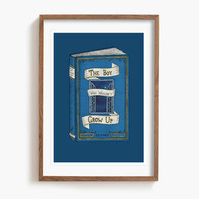 Framed artwork of a blue Peter Pan book with text on a white background