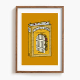 Framed artwork of a Secret Garden book with a door illustration on a yellow background