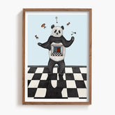 Framed artwork of a panda juggling on a checkered floor with a light blue background