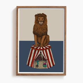 Framed artwork of a lion on a striped circus tent with acrobats inside.