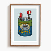 Framed artwork of a coffee can with hot air balloons on a light blue background