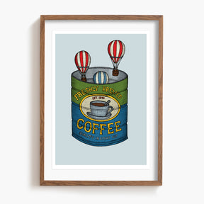 Framed artwork of a coffee can with hot air balloons on a light blue background