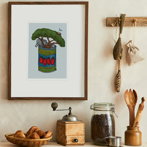 Kitchen wall decor with framed artwork of a tin of tomatoes, coffee grinder, and jars.