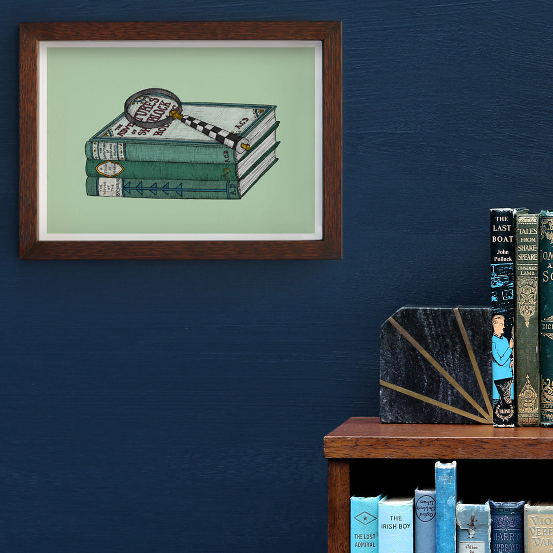 Sherlock Holmes art print framed on a blue wall